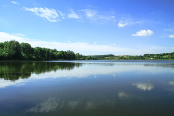 Beautiful river in a pretty area in Siberia. Landscape in Canada with a cold lake. Stock photo background.
