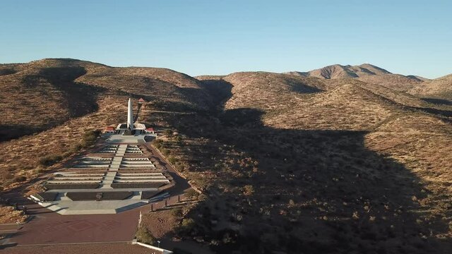 4K aerial drone video of African savanna hills, Heroes Acre memorial complex near B1 highway south of Windhoek in central highland Khomas Hochland of Namibia, southern Africa