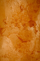 Bright grunge wall texture. Grunge vintage stone wall background texture with orange texture of...