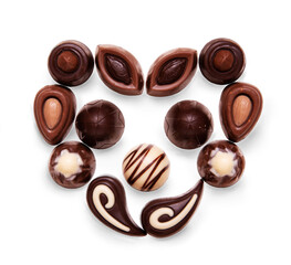 Chocolate candies on white background