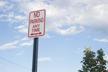 traffic sign with sky in background