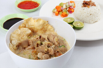 sop kambing or goat soup with hot sauce is from betawi jakarta 
 indonesian traditional food