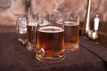 A glass of beer on a table. High quality photo