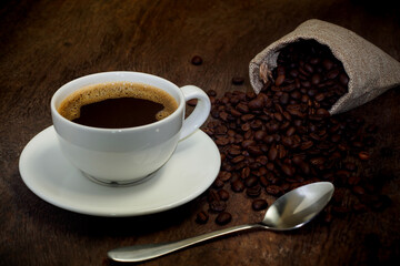 Hot coffee cups and coffee beans