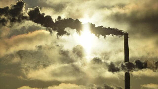 Factory pipe polluting air time lapse, environmental problems. Industrial factory pollution, smokestack exhaust gases. Industry zone, thick smoke. Climate change, ecology, atmoshere gas, ozone layer