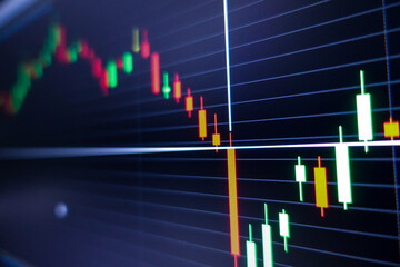 Stock exchange market graph on screen monitor. Economic and financial concept.