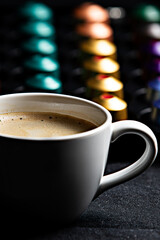 
coffee capsules, cup of coffee, coffee beans