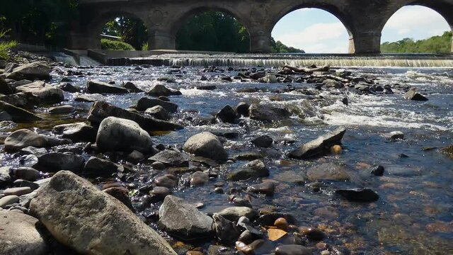 old stone bridge over river at Hexham