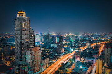 Bangkok City Aerial View and Skyscraper Cityscape of Thailand, Night Scenery View Business Downtown and Fianancial District of Thailand. Landscape Urban Skyscrapers Building of Bangkok Capital City