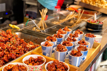Chicken fried in Myeong-dong street food, Seoul, South Korea - obrazy, fototapety, plakaty