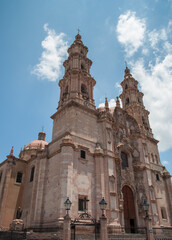 Fototapeta na wymiar Nuestra Señora de la Asuncion cathedral, city’s main church, whose baroque style front is extremely detailed Lagos de Moreno Mexican Town