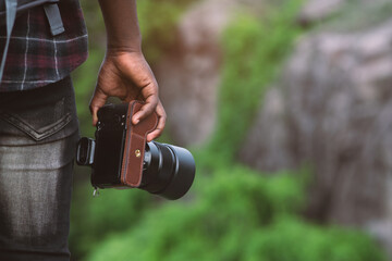 African man holding the camera