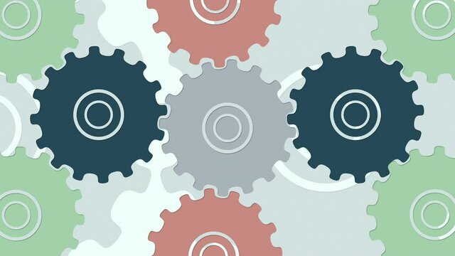 Colorful cogs accurately turning together like one integrated mechanism.