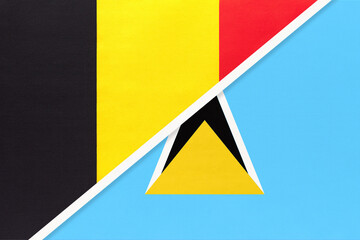 Belgium and Saint Lucia, symbol of two national flags from textile. Championship between two countries.
