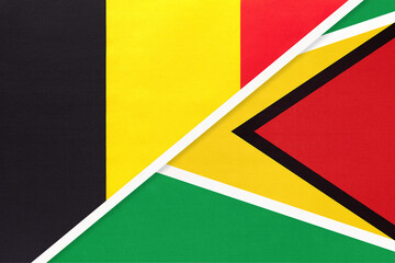 Belgium and Guyana, symbol of two national flags from textile. Championship between two countries.