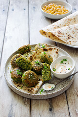 Roasted chickpeas Falafel patties on grunge clay plate