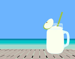 Apple smoothie on the beach