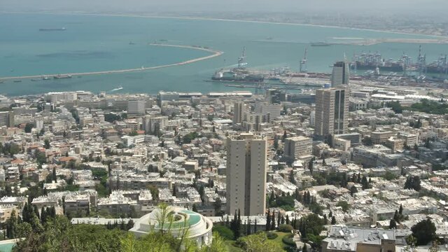 Wide panorama of Haifa port city by the Mediterranean sea from Mount Carmel