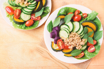 Salad quinoa with vegetables on plate, Vegan food