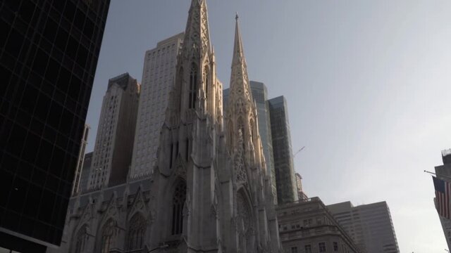 Slow motion tilt up of Saint Patrick´s Cathedral on fifth avenue, Manhattan, New York City. Moving from down view to up view from the left side.