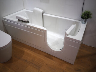 Fototapeta Handicapped disabled access bathroom bathtub with electric handles obraz