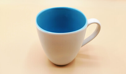 White ceramic coffee cup on background
