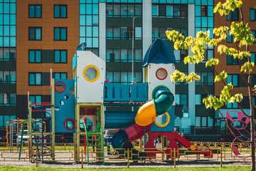 people are resting on the streets of a new modern residential area on a sunny day