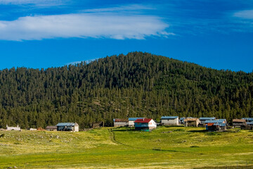 landscape of mountain village under blue sky