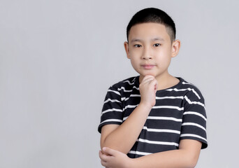 Asian boys studio portrait on gray background