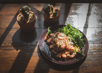 Thai style spicy salmon dice salad named 
