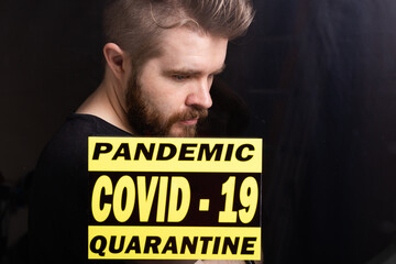 Coronavirus, quarantine, covid-19 and pandemic concept. Sad and sick man of corona virus looking...