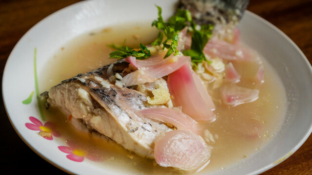 Steamed Rohu Fish In Lemon Sauce.