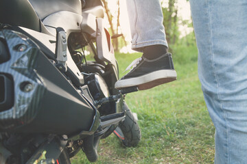 Start the engine of motorcycle with foot start.