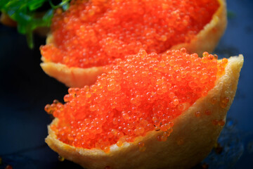 Fried tofu stuffed with rice and various topping such as fish roe, wakame, egg