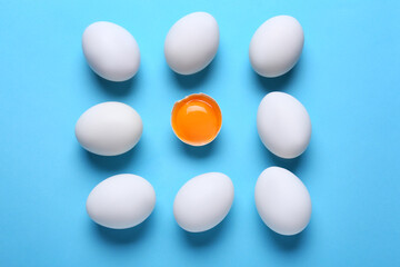 Fresh chicken eggs on color background