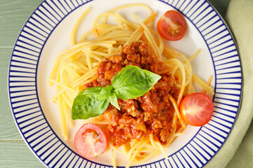 Tasty pasta bolognese on plate, closeup