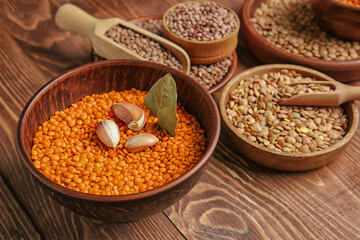 Different raw lentils on table