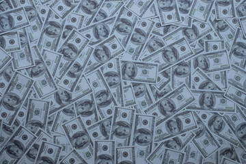 Group of money stack of 100 US dollars banknotes a lot of the background texture top view