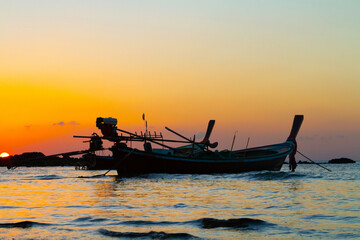 Traditional wooden boats on sunset, Koh Lanta, Thailand