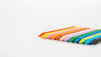 Colored pastel crayons on a white background. creativity, learning