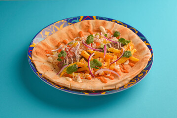 Lavash bread with grilled meat, vegetables, cheese. Shawarma lavash bread, fresh roll of lavash, pita bread.