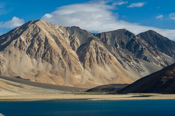 Pangong Tso or Pangong Lake is a lake in the Himalayas situated at a height of about 4,350 m. It is 134 km long and extends from India to the Tibetan Autonomous Region, China.