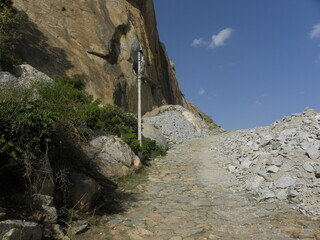 Rocky stone steps which leads to the top of the hill