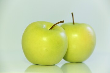 green apples on a white background