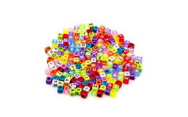 Colorful English alphabet cube on a white background.