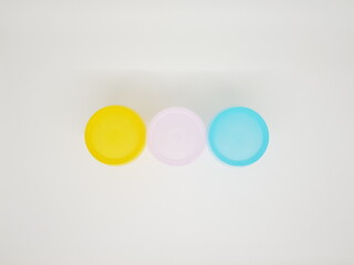 colorful plastic container over white background