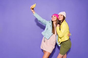 Portrait of nice attractive lovely cheerful cheery girls taking making selfie travel traveler trip...