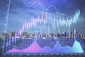 Forex graph on city view with skyscrapers background double exposure. Financial analysis concept.