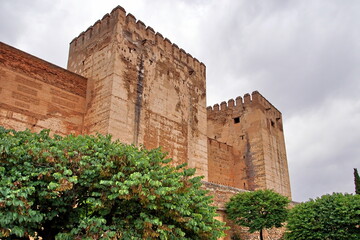 Fototapeta premium Alhambra or Red Castle in Granada spanish city, located on top of hill al-Sabika. Moorish palace fortress complex in Andalusia, Spain