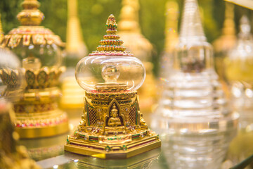 Fototapeta na wymiar Dhatu or sarira are small that look like pearls or crystals formed after the body is cremated after the death of Buddhist monks.